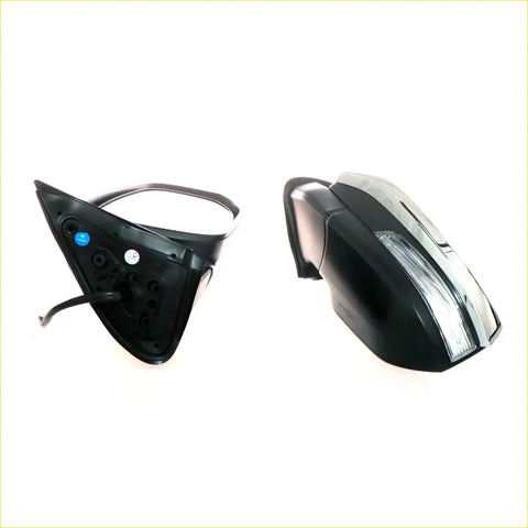 Black and silver chrome electric foldable side mirror with turn signal for Toyota Hilux 2015-2019 shown from the back side