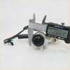 Black plastic push button cigarette lighter switch with wires and diameter measured by digital caliper for toyota hilux