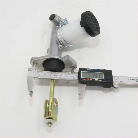 Silver metal clutch master cylinder with white reservoir black cap and brass pushrod for nissan datsun d21 navara 86-97