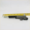 Gray metallic clutch slave cylinder for Mazda B-Series with black rubber boot and silver piston rod 20.1 inches long