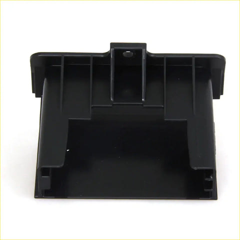 Black plastic cup holder bracket tray with molded compartments and central hole for toyota hilux kun26 interior