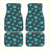 Set of four teal car floor mats with green heart patterns shown on dark gray background for custom use