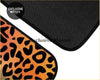 Custom rainbow leopard floor mats with orange and black print and textured non-slip rubber backing for cars