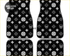 Black car floor mats with white skull and diamond shuriken pattern for a custom cool ride interior look