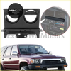 Black plastic dashboard cup holder tray with two gauge cutouts and radio compartment for toyota hilux 1989-1995
