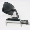Black plastic door fender mirror with rectangular reflective surface and curved arm next to digital caliper for nissan datsun ute 1966-1973