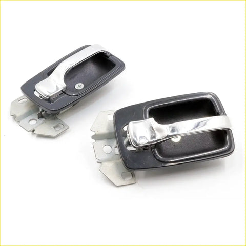Black plastic door handle bezels with chrome metal pulls and brackets for nissan datsun ute 620 1972-1979 back side
