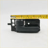 Black plastic door handle bezel with integrated latch for toyota hilux 2004-2013 shown from back side