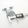 Gray plastic door hinge with two mounting flanges and central pivot measured by caliper for mitsubishi pajero sport
