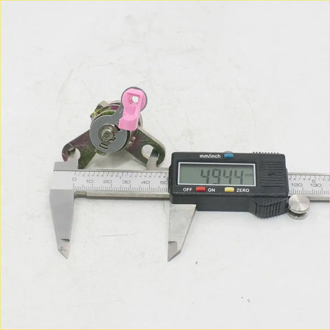 Door lock cylinder for nissan sentra almera 2000-2006 with metallic body and pink plastic handle measured at 49.44 mm