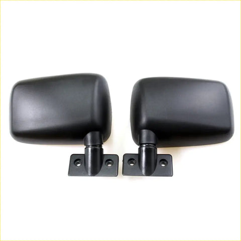 Black plastic door mirrors with mounting brackets shown from the back for mazda b-series 1985-1993