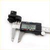 Black plastic door switch assembly latch for nissan quest elgrand 2011-2013 being measured with digital caliper