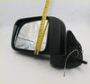 Black plastic electric door mirror with reflective glass and wiring for Nissan D22 Navara NP300 shown from back side
