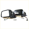 Black plastic electric door mirrors with integrated turn signals and wiring harnesses for nissan navara d22 back side