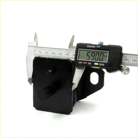 Black rubber engine mount for toyota hilux 2wd 2l 22r 1988-1997 with digital caliper measuring 59 mm