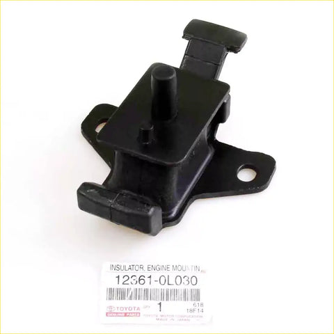 Black plastic engine mount insulator with central cylindrical protrusion for Toyota Hilux 2012-2015 engine mounts