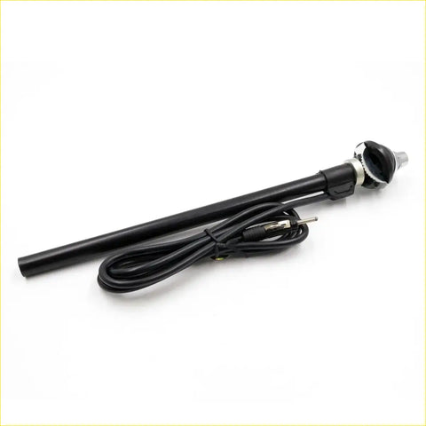 Black fender antenna for Nissan Datsun Bluebird with coiled cable and metallic connector shown from the back side