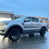 Silver ford ranger px3 2019-2021 with smooth style 4-inch fender flare black wheels and side steps shown from back side