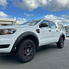 White ford ranger with black textured fender flares and rugged tires oem style for px3 2018-2021