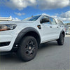 White ford ranger px3 with black textured oem style fender flares and rugged tires 2018-2021 model