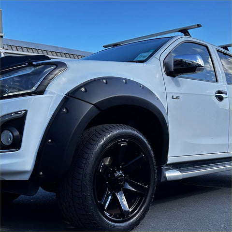 Black matte finished 9-inch bolt style fender flare with silver bolts on white isuzu d-max 2016-2020 back side