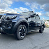 Fender flare for black nissan navara 2021+ with rugged matte finish and black and silver alloy wheels