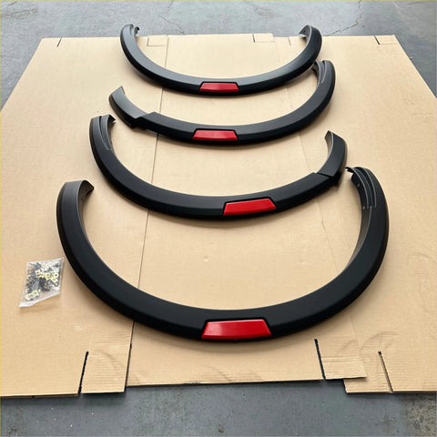 Black fender flares with red accent strips for nissan navara 2021 plus matte black oem style automotive customization