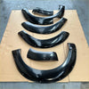 Set of five glossy black bolt style fender flares with smooth curves for nissan navara np300 2015-2020 st sl st-x