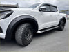 White mitsubishi triton pickup with black matte fender flares alloy wheels and side steps fender flare nissan navara np300 st sl stx 2015-2020 oem style