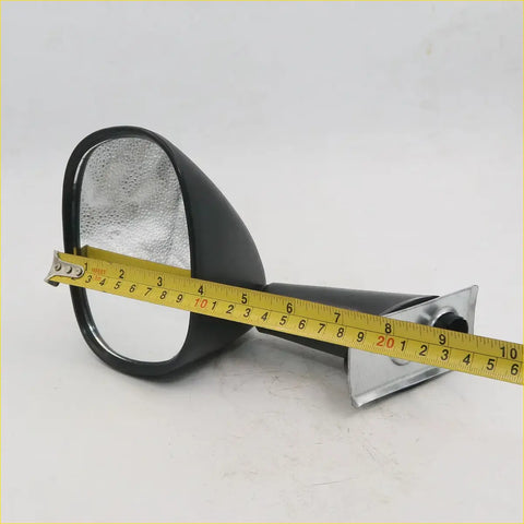 Black plastic fender mirror for mazda with silver reflective surface and metallic mounting bracket shown from back side