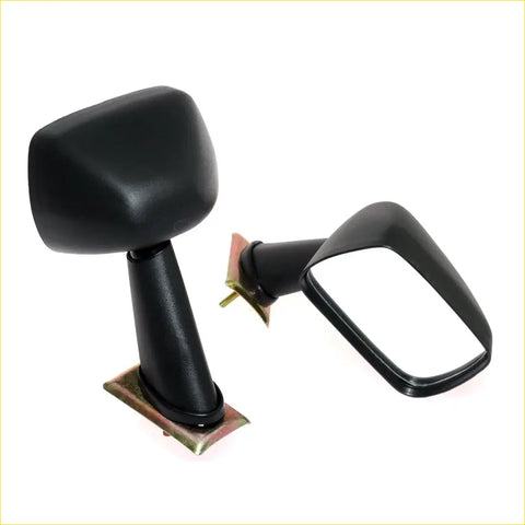 Black plastic fender mirror lh with rectangular housing and curved mounting arms for nissan datsun ute 1971-1994