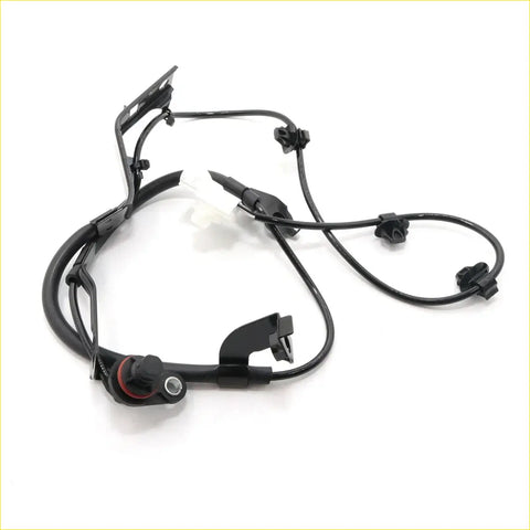 Front abs wheel speed sensor lh for toyota hilux with black molded plastic housing and coiled wiring assembly