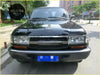 Front bumper radiator grille for black Toyota Land Cruiser 100 with chrome grille and headlight bezels