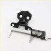 Black plastic front door hinge for Toyota Hilux 1978-1983 with two circular holes and central hinge mechanism visible
