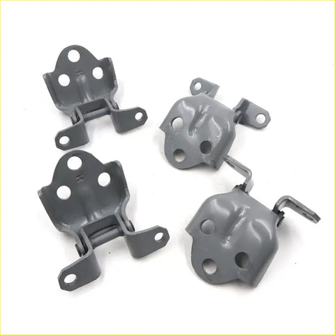 Gray metal front door hinge assemblies with matte finish and multiple mounting holes for mitsubishi triton 96-06
