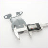 Gray plastic front door hinge with two flanges and central pivot measured by caliper for mitsubishi triton l200