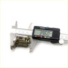Metallic front door lock cylinder being measured with digital caliper for mitsubishi outlander airtrek keys