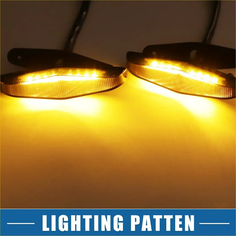 A pair of amber led motorcycle turn signals with sleek curved design and black mounting brackets for toyota 4runner trd pro