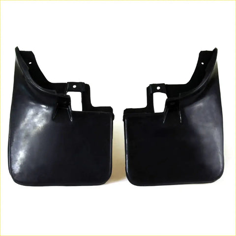 Black rubber front mud guard flaps for nissan navara d22 1997-2005 with molded mounting brackets visible