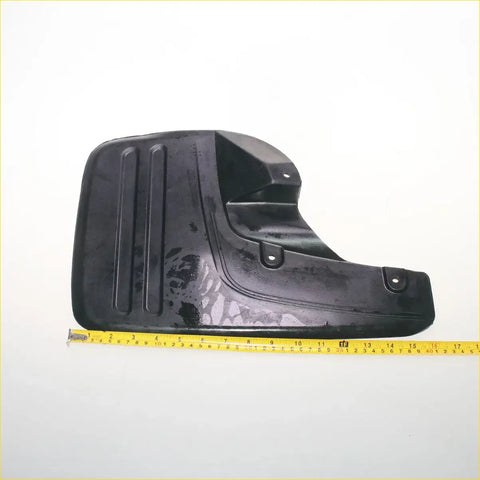 Black rubber front mudflap with ribbed texture and mounting holes for toyota hilux sr5 4x4 2012-2015