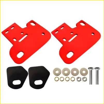 Red plastic front recovery tow point brackets with black rubber pads and metal hardware for mitsubishi pajero sport