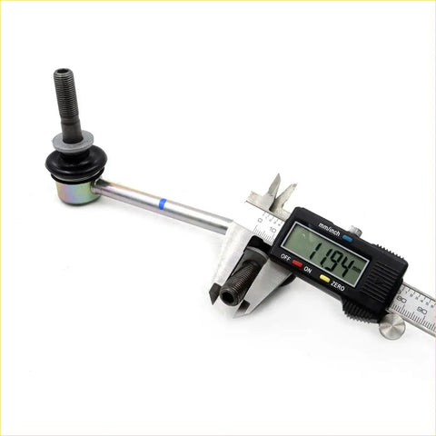 Silver metal front stabilizer link with black rubber bushing and threaded ends measured by digital caliper for Toyota Hilux