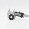 Black rubber front tension rod bush for datsun nissan ute 620 1972-1979 being measured with digital caliper