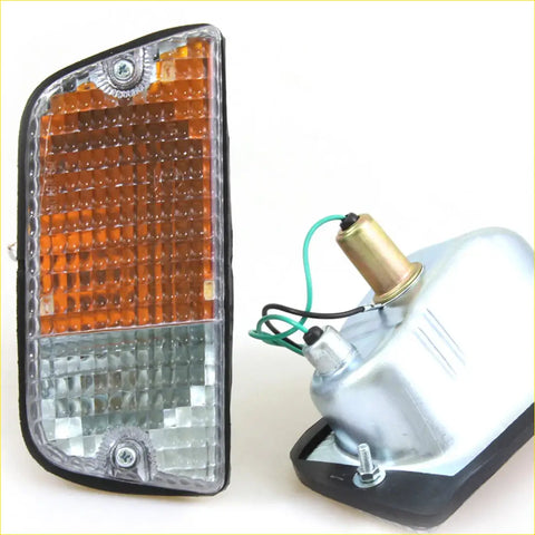 Orange and clear lens front turn signal light with black trim and textured grid for nissan datsun 620 ute 1972-1979 lh