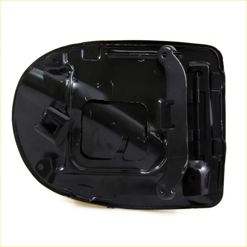 Black plastic fuel door cover with molded contours and integrated latch for nissan navara king cab d40 2007-2014