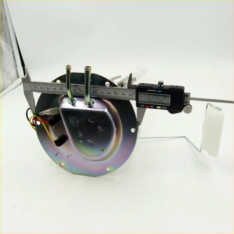 Shiny metallic fuel gauge sending unit with three rods and wires measured by digital caliper for nissan datsun d21