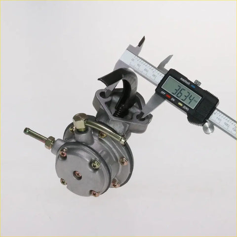 Silver metallic fuel pump assembly with black rubber parts measured by digital caliper for nissan datsun 720 1980-1986