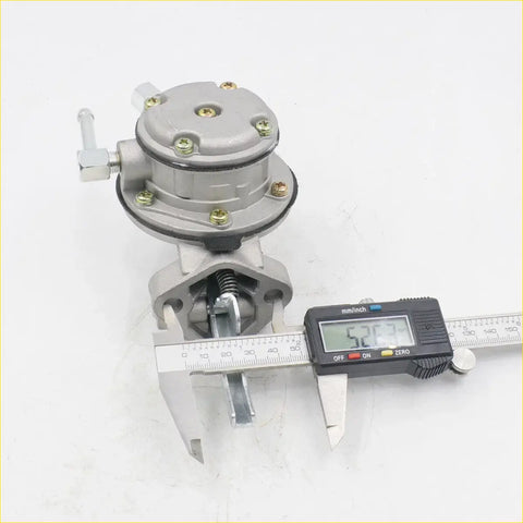 Gray metallic fuel pump for nissan datsun bluebird 910 911 912 with brass screws and silver handle measured by caliper