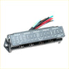 Black plastic fuse block assembly with labeled slots and colorful wiring terminals for Nissan Datsun 720 1980-1989