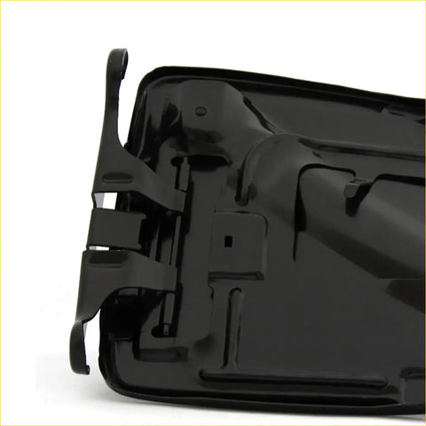 Black plastic gas fuel door cover with molded contours and mounting brackets for Nissan Navara double cab 4x4 D40